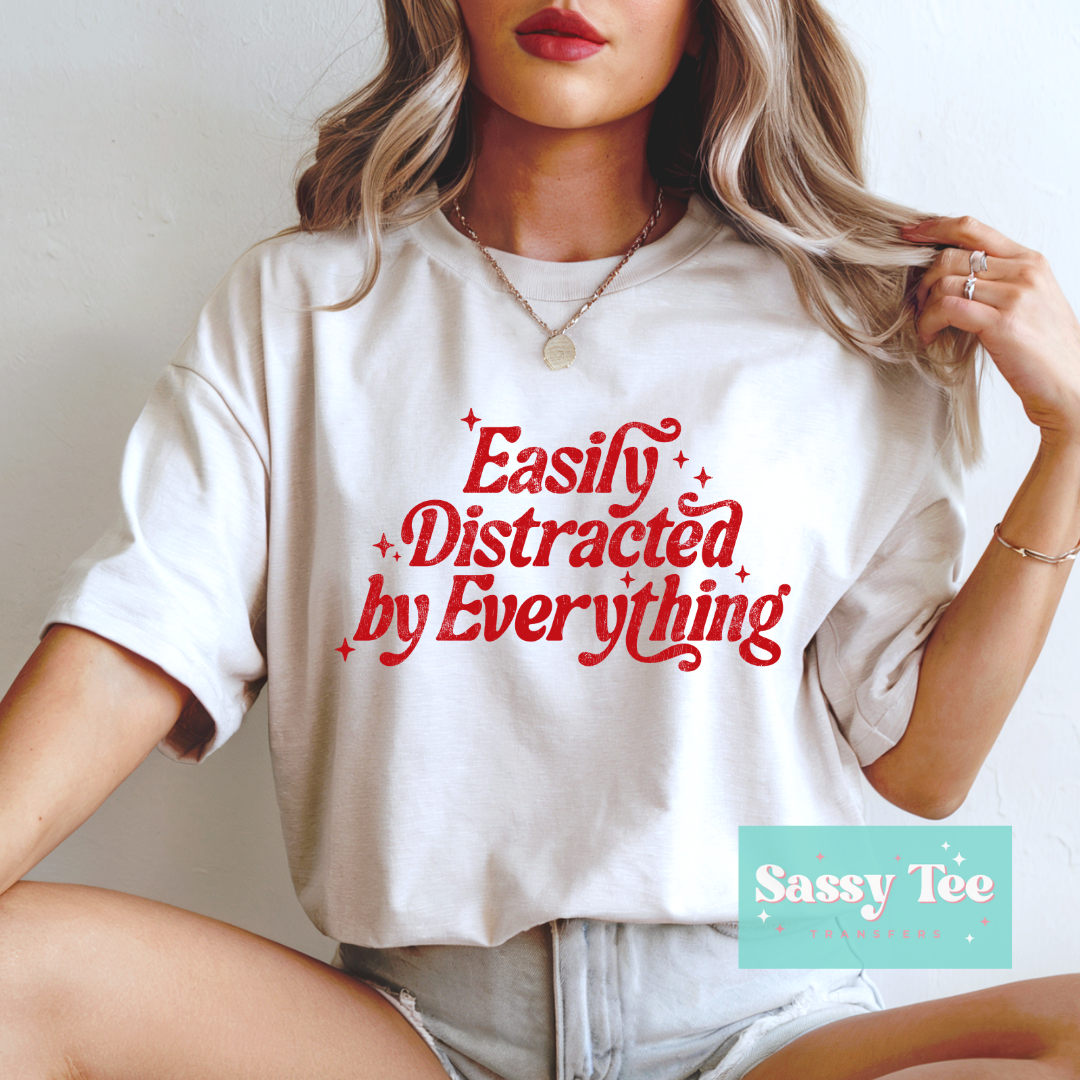 EASILY DISTRACTED BY EVERYTHING Options: Red, Black or White **Preorder/Restock Ships in 5-10 biz days**