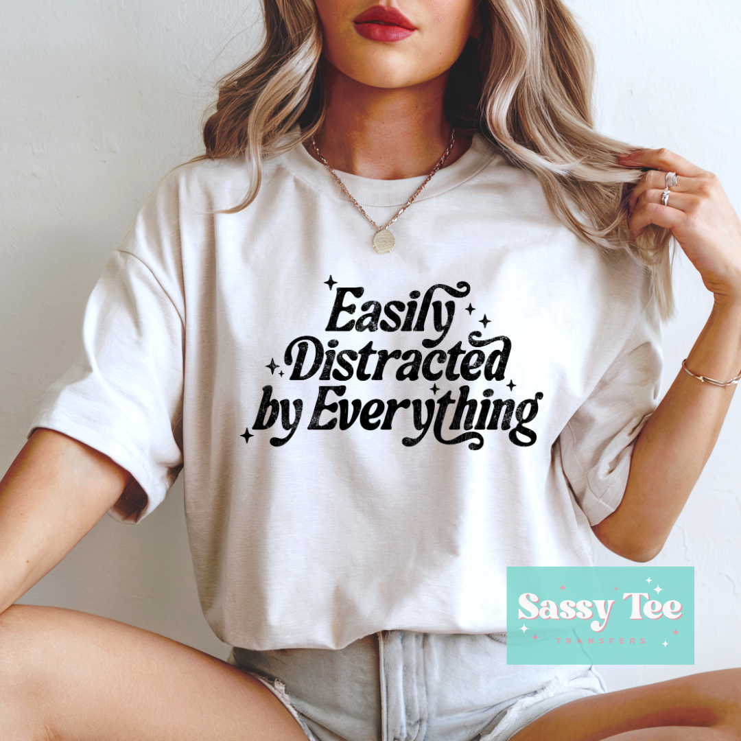 EASILY DISTRACTED BY EVERYTHING Options: Red, Black or White **Preorder/Restock Ships in 5-10 biz days**
